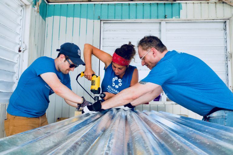 Volunteer opportunity- NECHAMA volunteers repair a roof