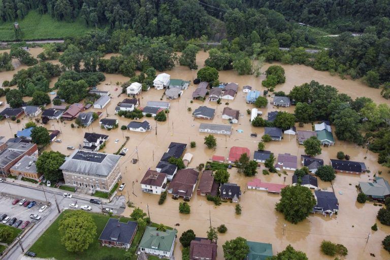 An aerial view shows homes submerged under floodwaters from the North Fork of the Kentucky River in Jackson, Ky., on Thursday. (Leandro Lozada/AFP via Getty Images)